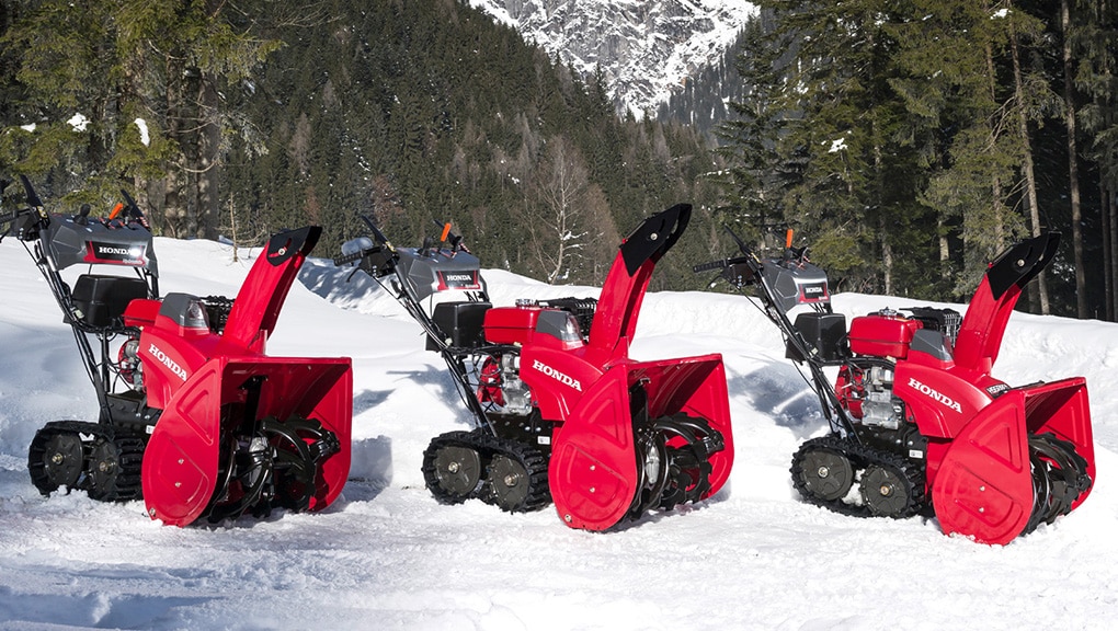 Image of 3 power equipments in the snow