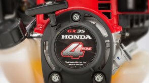 A close-up image of a Honda handheld tool's engine.    