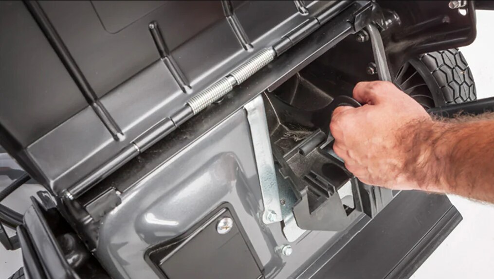 Skilled Technician working on a lawnmower